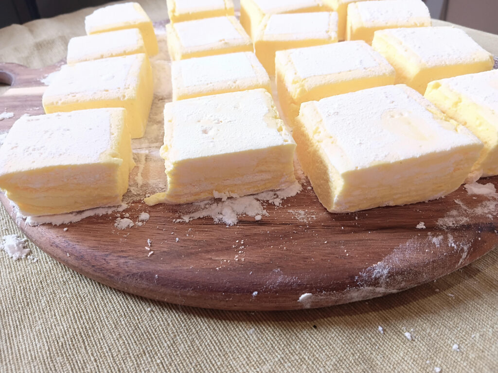 lemon marshmallows on wooden board