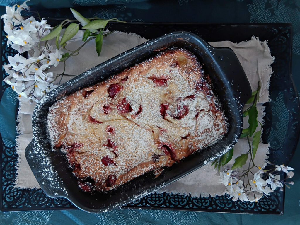 Strawberry Dutch baby with icing sugar