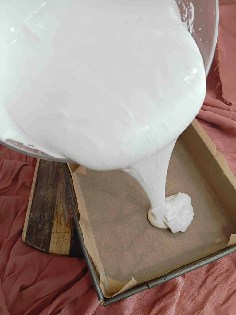 Vanilla marshmallow pouring into tray
